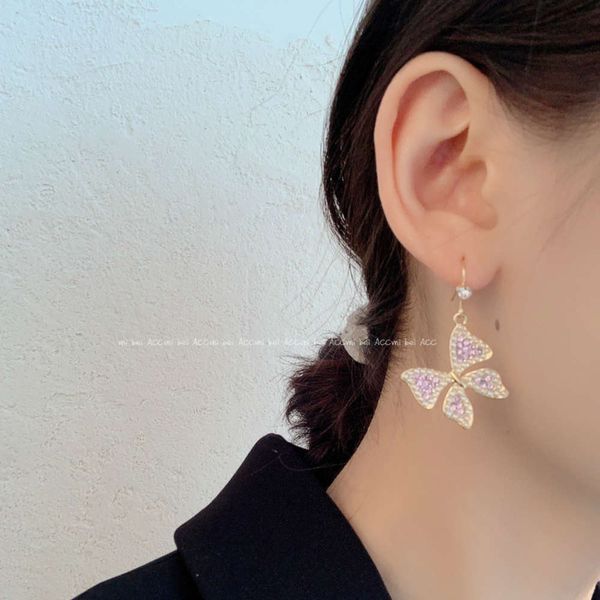 

purple butterfly pearl korean temperament net red 2020 new fashion high-end sense women's earrings, Black