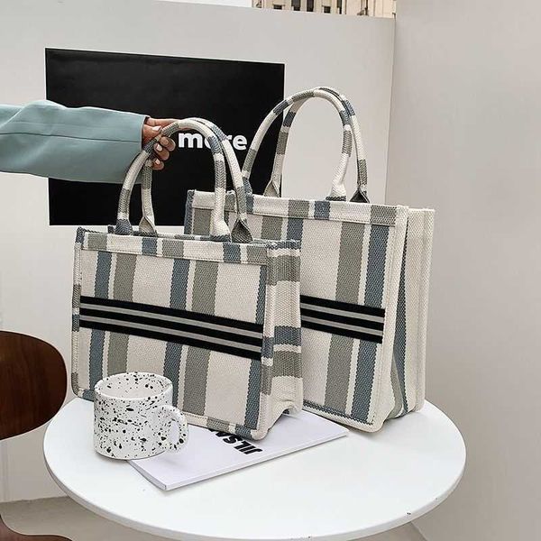 

wholesale 2021 vertical canvas shopping versatile portable one shoulder bag for female students luxuryss designerss yw