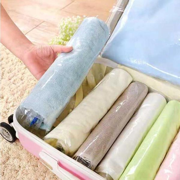 

clothing & wardrobe storage roll-up compression bag space saver travel luggage no vacuum needed 2