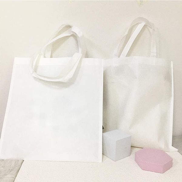 

storage bags 50pcs/lot white blank shopping handbags heat transfer portable printing customized non-woven fabric candy bag