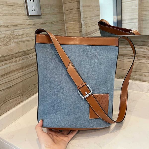 

2021 new denim stitched leather one shoulder messenger bag x paula's ibiza bucket bag factory outletzly