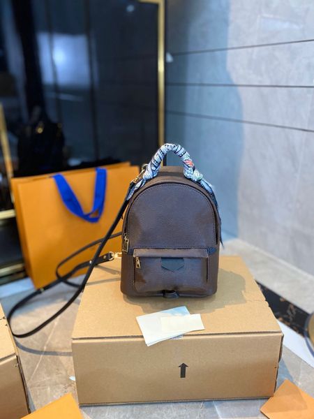 

2021 new fashion trend mini backpack imitation women school bags bags temperament classic fashion old flower backpacks patent leather purse