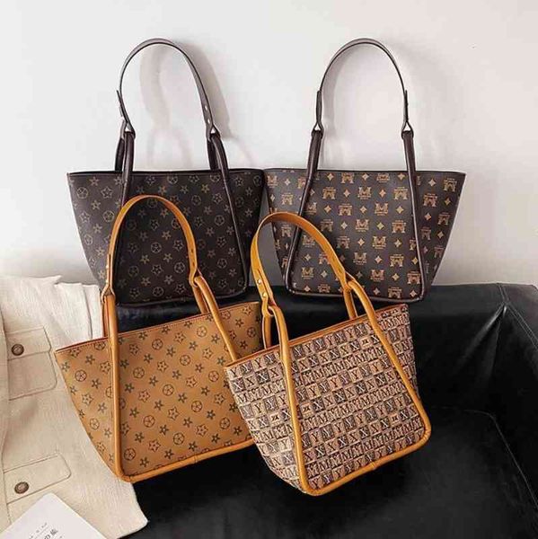 

2022 factory wholesale new net red super fire large capacity one shoulder armpit commuter women's autumn and winter trendy old flower p