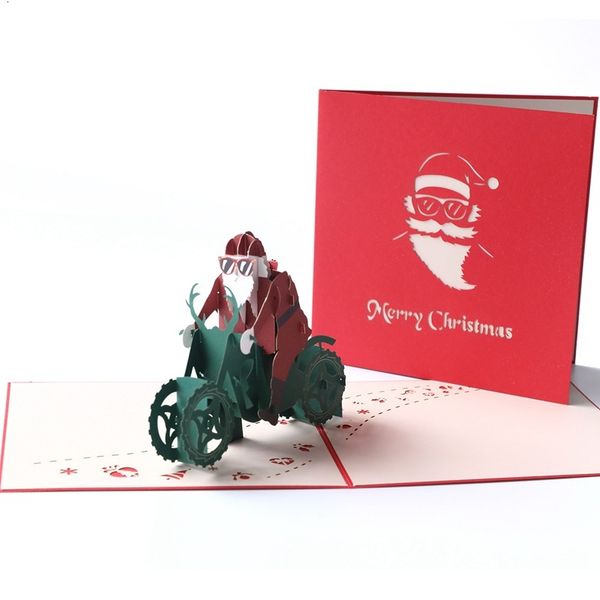 

silhouettes paper carving greeting card santa riding a motorcycle creative hand-made three-dimensional christmas gift