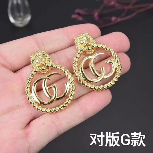 

design jewelry light luxury letter new fashion ancient women's simple and versatile earrings golden lion head, Silver