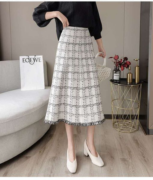 

skirts xiaoxiangfeng plaid knitted women's 2021 spring and autumn medium length a-line tassel wool long skirt, Black