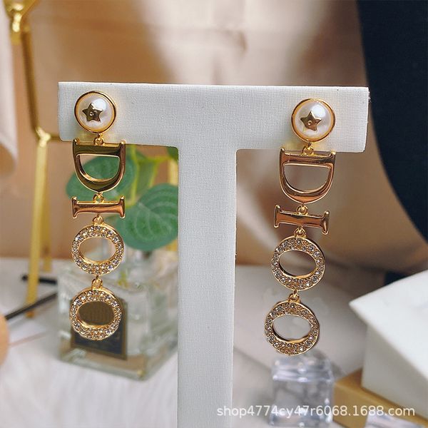 

japan and south korea net red five pointed star pearl new product d letter rhinestone long earrings fashion trend629o, Black