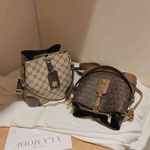 

2022 factory wholesale new model bag old flower bucket bag autumn versatile messenger women's capacity single shoulder trend bags
