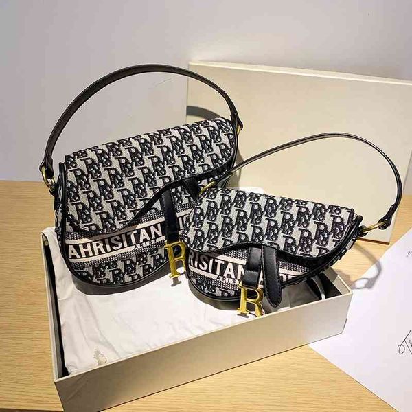 

design this year's popular new fashion saddle women's messenger versatile semi-circular bag handbags