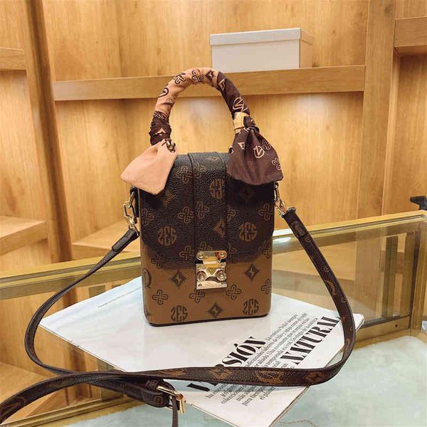 

2022 factory wholesale wanghong yangqi small korean version fashion ribbon ins girl's portable messenger box bag