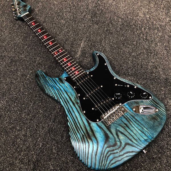 

charcoal baked white wax wood electric guitar, blue frosted matte