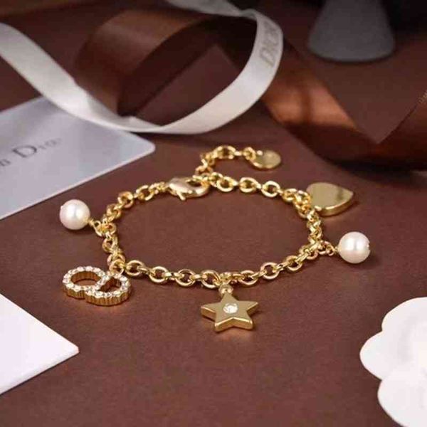 

luxry fashion design bracelet jewelry d/or camonpearl net resame temperament high version brass material, Golden;silver