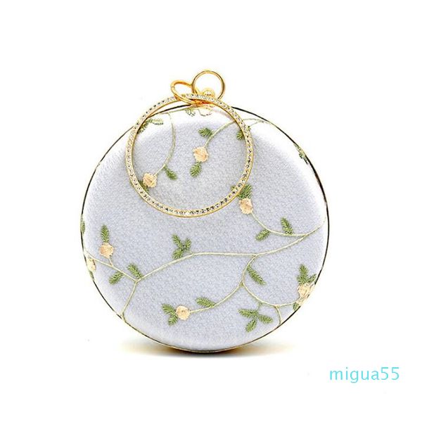 

embroidered green leaf round dinner bag clutch celebrity evening