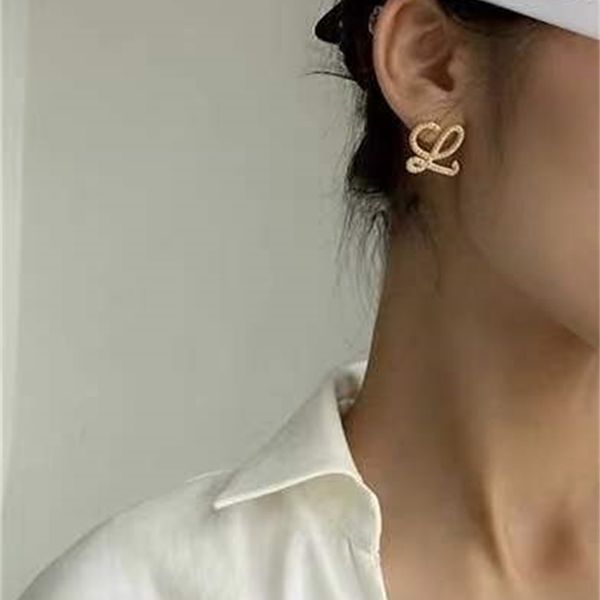 

pearl curve earrings blogger's net red same geometric abstract wind earrings, Golden