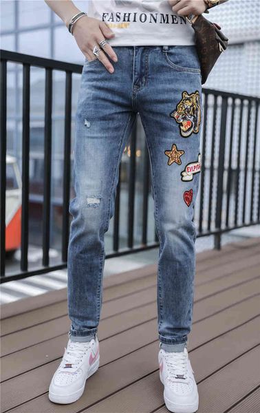 

jean spring and summer fashion tiger-embroidered brim personality trend hole strain thin pants, Blue