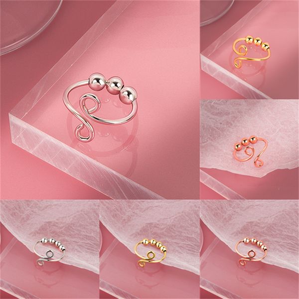 

woman with twirling bead ring female rings adjustable opening, Silver