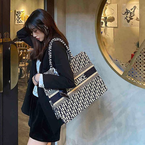 

luxury herme handbags and storage large tote women's large capacity new simple canvas commuting fashion shopping portabl