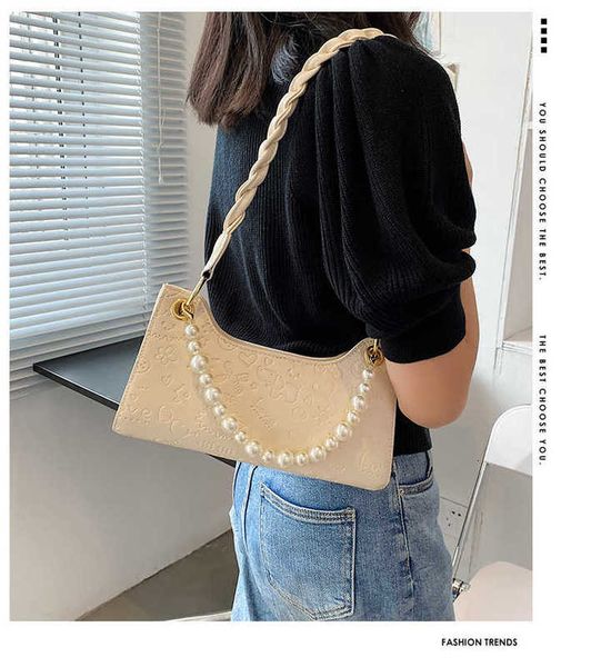 

underarm milk tea color french stick women 2021 fashion net red crowd dign pearl single shoulder bag