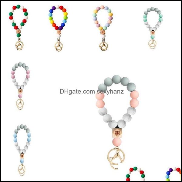 

keychains fashion aessories 7 style sile bead bracelet party favor beech tassel keychain pendant bracelets ladies jewelry gwa10355 drop deli, Silver