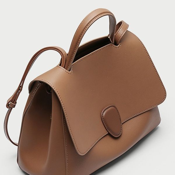 

korean xiaozhong hand-held cowhide bag simple one shoulder slanting bag fashion contrast leather commuting large capacity women s bag