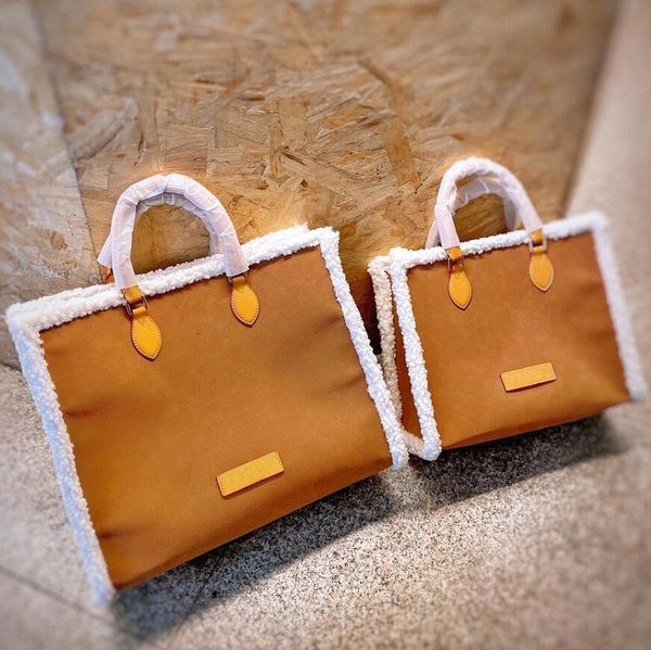 

designer onthego 2021 ss ladies crossbody bag vintage handbag plain classic letter cowhide double handle delicate tote bags women fashion sh