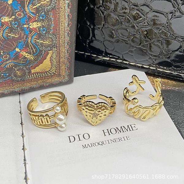 

designers luxury fashion d family high sense irregular metal opening female minority design index finger personality cold wind ring tide, Red;brown