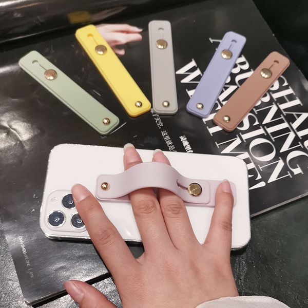 

universal wrist band phone holder for iphone finger grip cellphone stand for samsung xiaomi push back sticked socket bracket