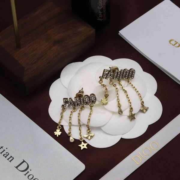 

2021 new designer new family letter tassel earrings in 2021, Golden