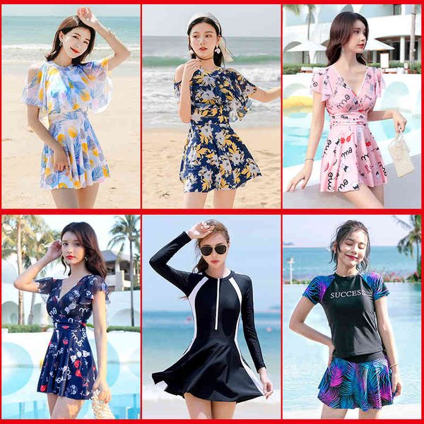 

piece skirt covering belly and showing thin one swimsuit, White;black