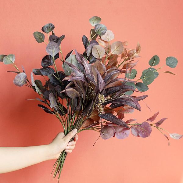 

decorative flowers & wreaths autumn eucalyptus / flower arrangement with green leaves and plants, artificial flowers, wedding soft decoratio