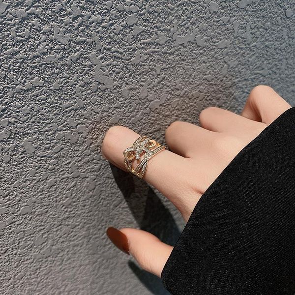 

cluster rings sell well in europe and america simple fashion personality bow zircon female ring, Golden;silver