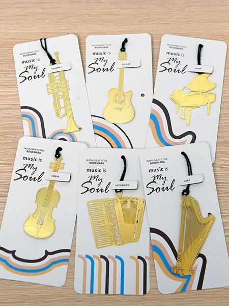 

bookmark gold hollow piano guitar violin music stationery prize musical instrument book mark marks bookmarks for books