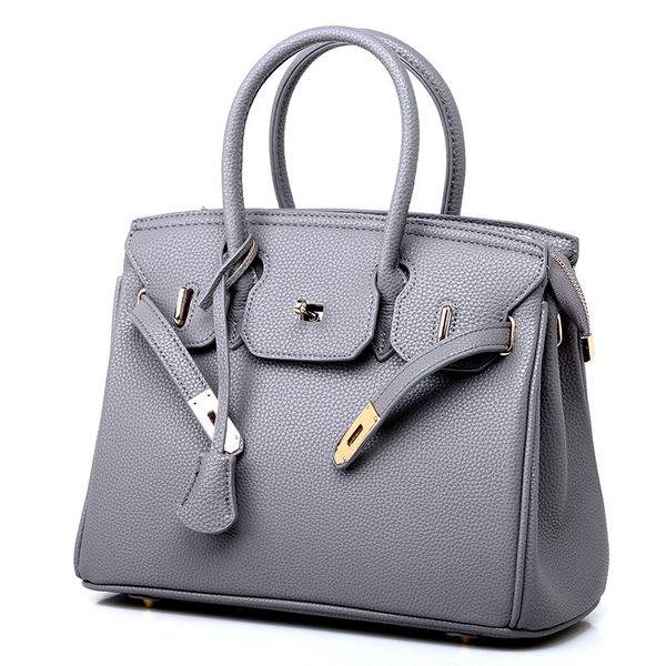 

guangzhou 2021 new fashion litchi pattern straddle one shoulder women's handbag