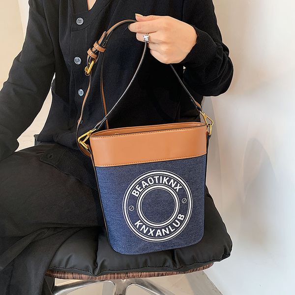 

70% s new printed canvas single shoulder hand bucket messenger bag