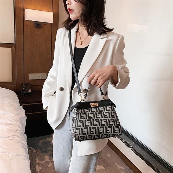 

new women's bag simple shoulder atmospheric messenger bag fashion piece pu