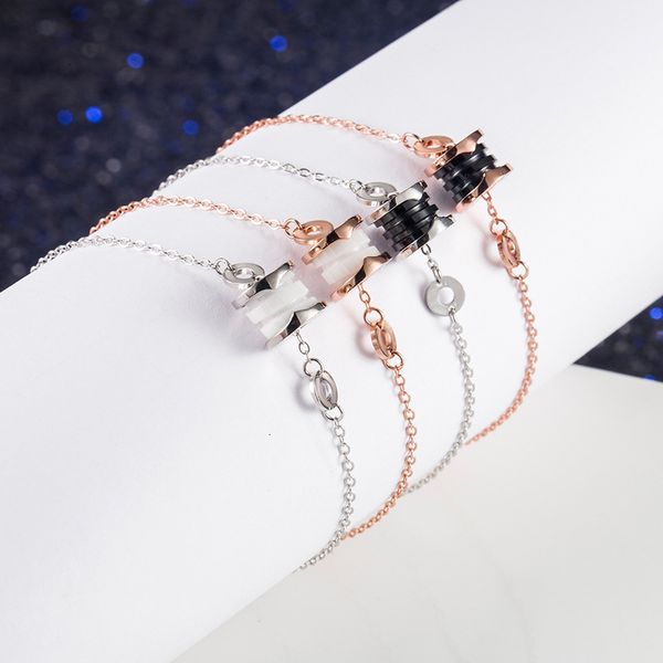 

s925 sterling silver little red man bracelet classic black and white ceramic lovers charity net, Golden;silver