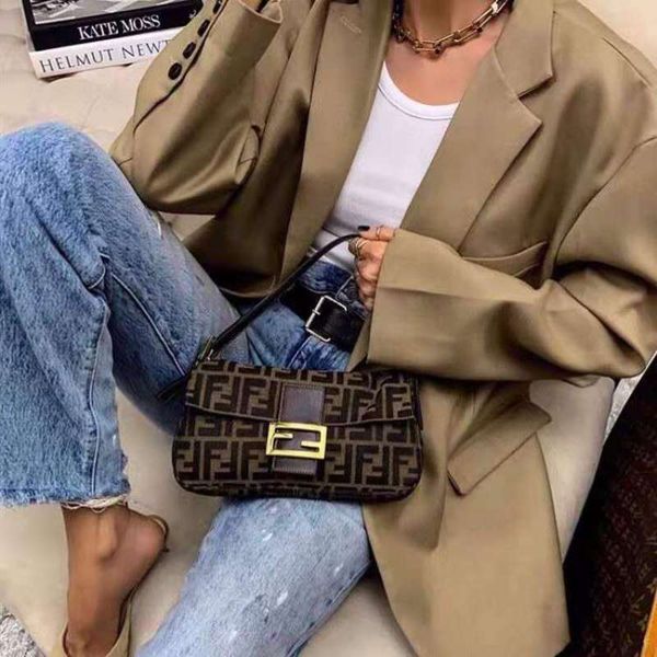 

niche design female 2021 new versatile canvas hand bag armpit staff single shoulder messenger bag