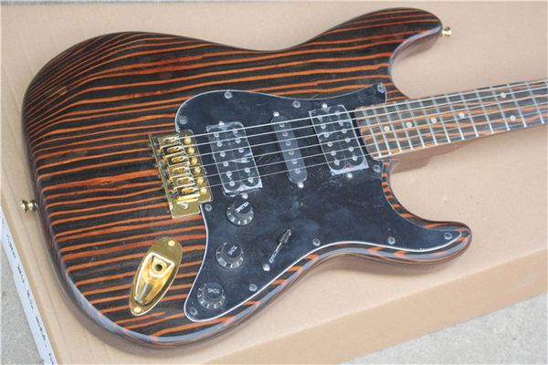 

customized version of zebra wood electric guitar gold accessories black guard