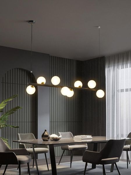 

nordic restaurant chandelier modern minimalist personality three-headed bar lamp creative magic bean strip pendant lamps