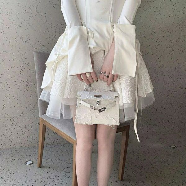 

2021 new beggars' kelly military cloth splicing canvas tassel handbag