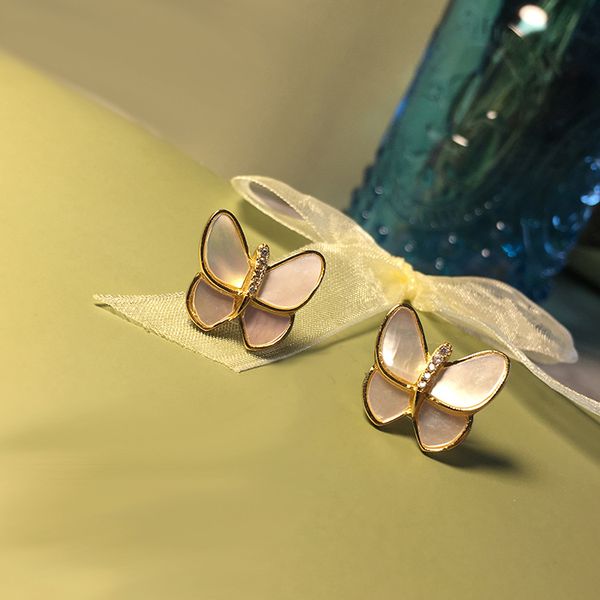 fahion Orecchini a bottone a farfalla con conchiglia in acciaio inossidabile Orecchini a bottone 18k Orecchini in oro rosa per donna