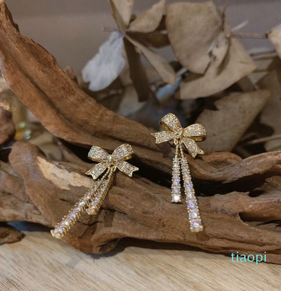 

french bow with tassel and pearl earrings chandelier, Silver
