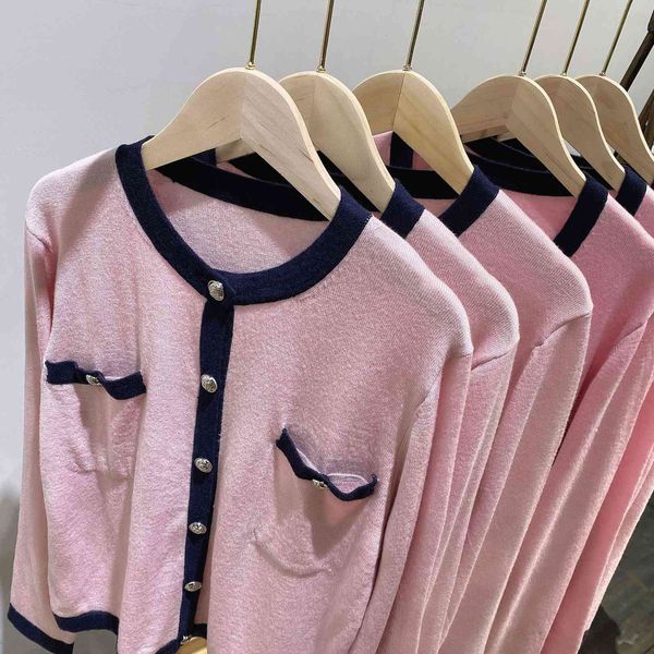 

2021 spring and autumn new loose trend pink round neck wool cardigan, White