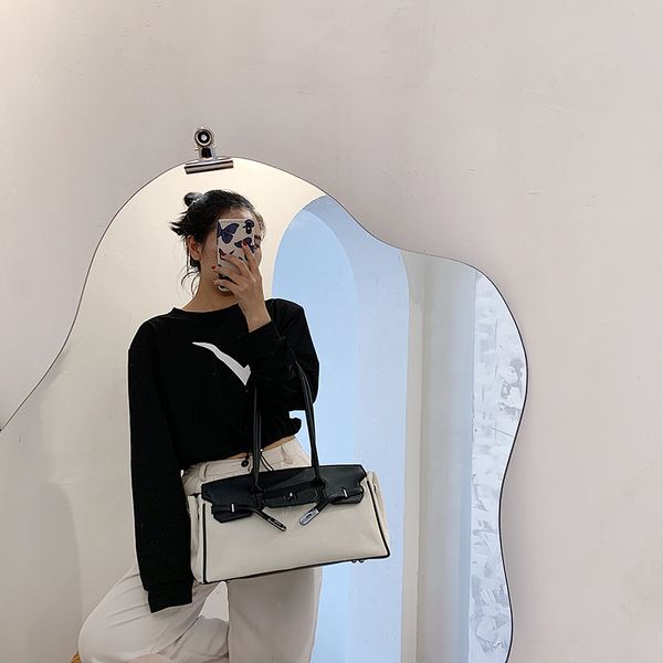

canvas 2021 new fashion large capacity one shoulder hand-held women's spoof kelly armpit bag
