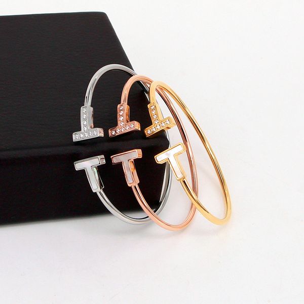 

h9-208 japanese and korean cnc micro inlaid diamond one side shell double chaonu t letter hollow hose bracelet, Silver