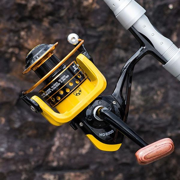 

high speed 5.2:1 max power fishing reel yellow for sea rod metal wooden grip baitcasting reels