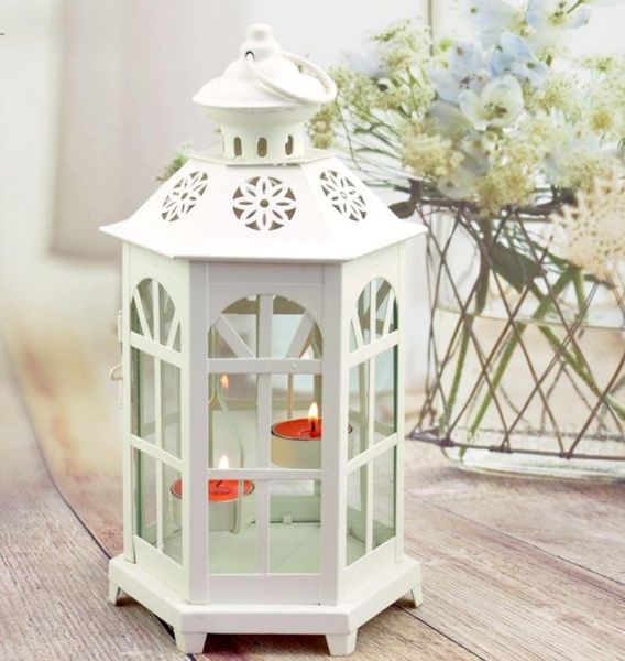 

creative metal hollow candle holders white and black craft light tea home decoration candlestick wedding chandelier