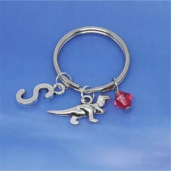 

keychains tyrannosaurus rex keychain cool gift dinosaur with red bead and initial, Silver