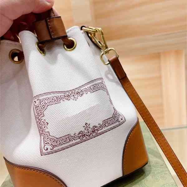 

autumn and winter cute color blocking splicing canvas drawstring bucket sling shoulder diagonal span bag small mini female purse