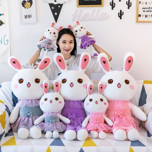 

rabbit plush toys sleeping on large bed, pillow dolls,